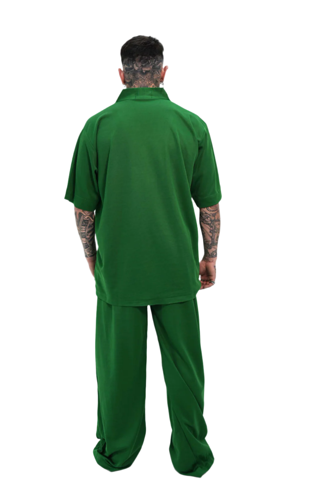 Person wearing a green outfit on a white background