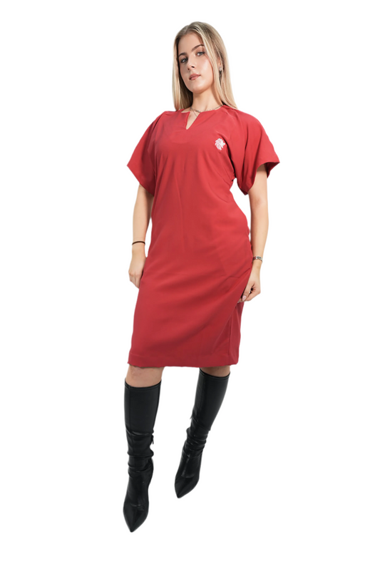 Woman wearing a red dress with a small logo on a white background