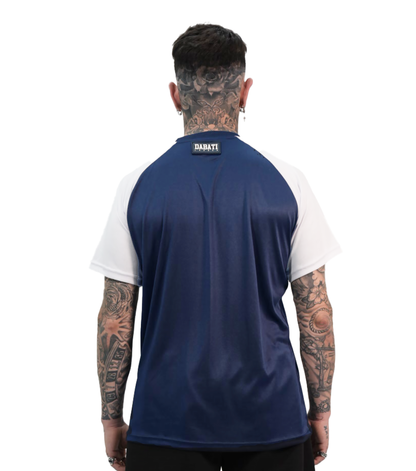 Back view of a blue and white sporty T-shirt from Dabati London, featuring contrasting blue raglan sleeves and a clean white body. The quick-dry fabric ensures comfort and flexibility, perfect for activewear and everyday use